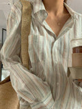 long-sleeved shirt with button placket and colorful stripe