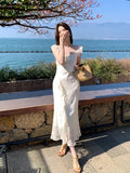 Fongt Xixi 2025 Summer New Korean Version Of High-Waisted Holiday Sling Dress V-Neck Print Pure Desire Skirt 88297
