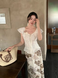 Fongt Xixi 2025 Summer New Elegant Temperament Flowers V Collared Leaf-Side Shirt Thin Top Lady 89387
