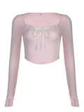 pink knit top with square neckline and lace