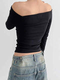 black slim long sleeve top with off