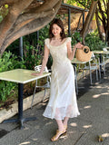 Fongt Xixi 2025 Summer New Korean Version Of High-Waisted Holiday Sling Dress V-Neck Print Pure Desire Skirt 88297
