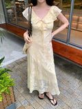 Fongt Xixi 2025 Summer New Korean Version Of High-Waisted Holiday Sling Dress V-Neck Print Pure Desire Skirt 88361