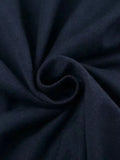 dark blue long sleeve top with letter