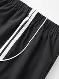 sport black baggy jogging pants with side piping