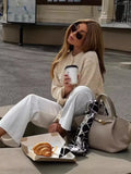 New Autumn / Winter Loose Casual All False Pocket Round Collar Sweater Button Cardigan Women's Wear-Outfit