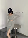 Fongt New Suit Hottie Exposed Umbilled Long-Sleeved Top + High Waist Open Half-Body Bag Skirt Two