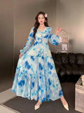 Fongt Dress Women 2025 New High-End Sense V-Neck Pearl Buckle Lantern Sleeves Wide Swing Print Long Skirt
