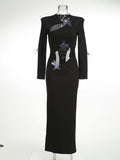 New Women's Sexy Hollow Long-Sleeved Black Dress Metal Decorated Open Forked Ass And Hip