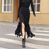 TWOTWINSTYLE Black Cut Out Midi Skirt For Women High Waist Solid Patchwork Tassel Hem Long Skirts Female Fashion Clothing