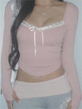 pink knit top with square neckline and lace