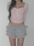 pink knit top with square neckline and lace