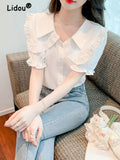 Fashion New Petal Sleeve Solid Color Single Breasted Blouses 2023 Summer Peter Pan Collar Chic Top office lady Shirt